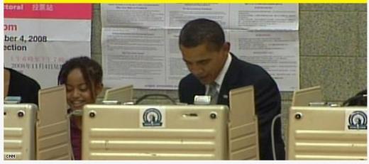 ↑ 투표하는 오바마. 출처:CNN