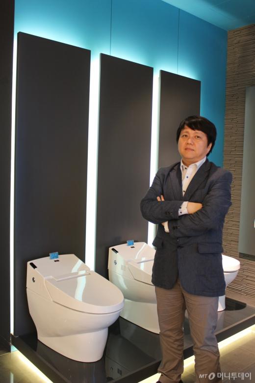"'똥통'에 무슨 디자인이냐구요?"