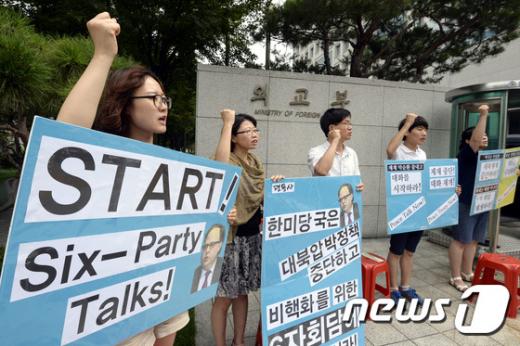 [사진]구호 외치는 평통사