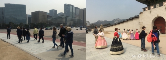 미세먼지가 하늘은 뒤덮은 지난 27일 서울 광화문을 찾은 외국인 관광객들이 마스크도 하지 않고 여행을 즐기고 있다. /사진= 유승목 기자