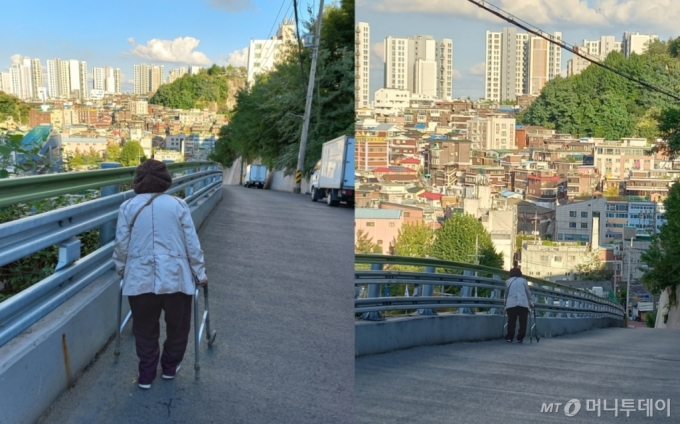 사진= 30년 차 거주자인 고령의 여성 A씨가 경사진 언덕을 내려간다 /사진= 양윤우 기자 