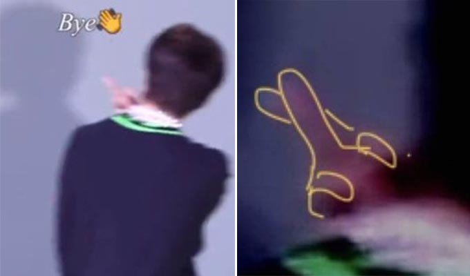 그룹 NCT 127 마크가 해찬에게 손가락을 들어보이는 모습을 한 누리꾼이 분석한 사진./사진=트위터 캡처