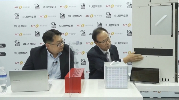 유팩TV에서 자사의 창호형 공기청정기 원리를 설명하고 있는 박준국 웰킨에어 대표