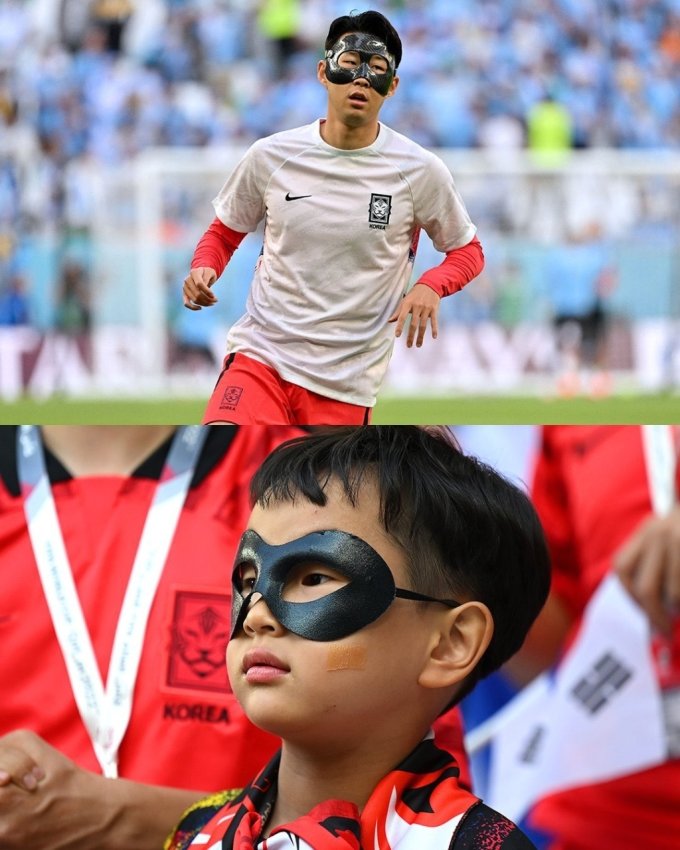 24일 카타르 알라이얀 에듀케이션 시티 스타디움에서 열린 월드컵 H조 1차전 우루과이와 경기에서 꼬마 팬이 검은색 마스크를 쓰고 응원하고 있다./사진=트위터