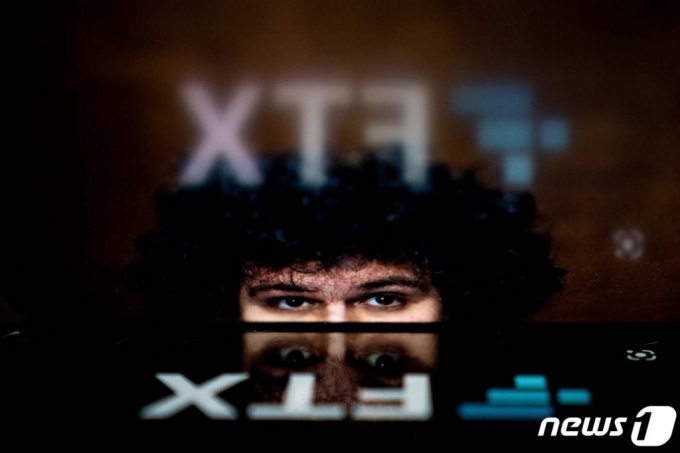 (̱ AFP=1) Ӽ  = ʴ ڻ ŷ FTX ְ濵 (CEO)  ũ  FTX ΰ.  11(ð) FTX ׷  130 ȸ簡 ̱ Ļ û   ߴٰ .    AFP=1  Copyright (C) 1. All rights reserved.     .