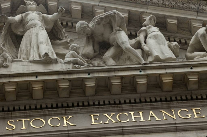 The New York Stock Exchange (NYSE) in New York City, where markets roiled after Russia continues to attack Ukraine, in New York, U.S., February 24, 2022. REUTERS/Caitlin Ochs/==1