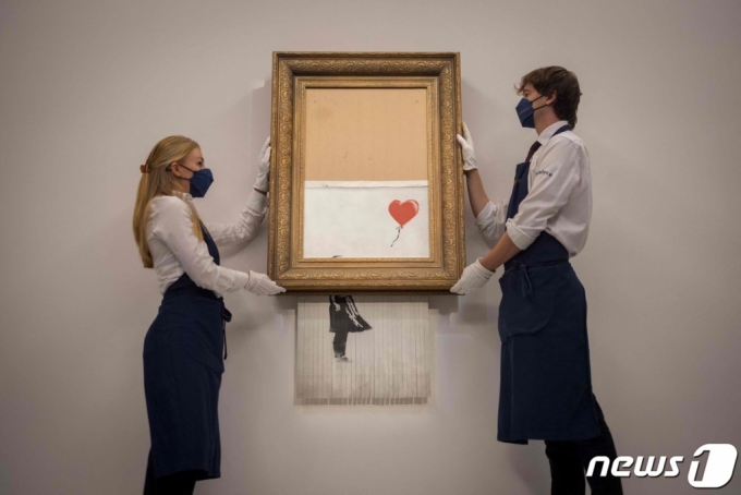 ( AFP=1)   = ũ &#039;ǳ ҳ&#039; 2018   ߰ ڸ ļ ̺Ʈ    پ. ׸   ļ · 2021 ſ ٽ   ǰ 18582000Ŀ忡 ƴ. ũ ǰ   ְ ̴. (C) AFP=1 