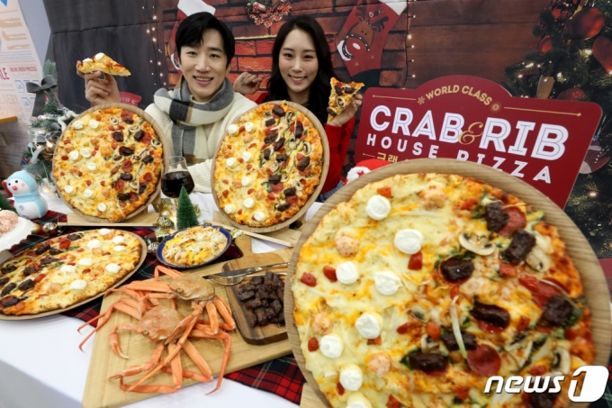 도미노피자, 내일 50% 할인 지급...SKT MZ고객 대상 - 머니투데이 도미노피자, 내일 50% 할인 지급...Skt Mz고객 대상 - 머니투데이