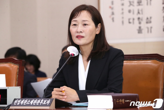 (서울=뉴스1) 임세영 기자 = 정정미 헌법재판관 후보자가 29일 오전 서울 여의도 국회 법제사법위원회에서 열린 인사청문회에서 의원 질의에 답변하고 있다. 2023.3.29/뉴스1 Copyright (C) 뉴스1. All rights reserved. 무단 전재 및 재배포 금지.