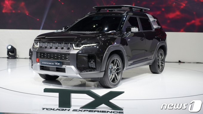 (=1) = KG Ƽ 30 ⵵  Ųؽ  &#039;2023 Ƽ&#039;  翡 ֿڵ  ̸ KG Ƽ  CI ϰ   SUV ䷹ EVX   ܼƮ  O100, F100, KR10  ߴ.    ƿ Ȱ  ͽƮ   ䷹ ξ Ȯ   &#039;䷹ TX&#039;. (KG Ƽ ) 2023.3.30/1  Copyright (C) 1. All rights reserved.     .