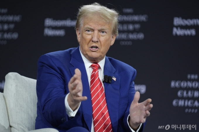 Republican presidential nominee former President Donald Trump speaks during an interview with Bloomberg News Editor-in-Chief John Micklethwait during an event with the Economic Club of Chicago, Tuesday, Oct. 15, 2024, in Chicago. (AP Photo/Evan Vucci)