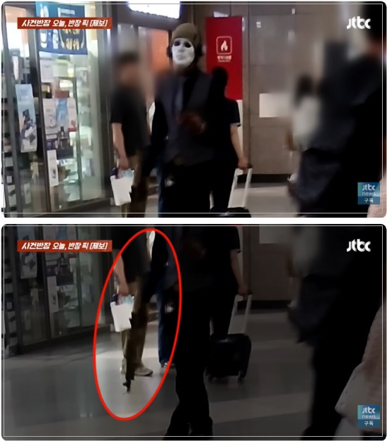 "용산에 테러범?" 시민들 깜짝...흰 가면 쓰고 장총 든 남성, 정체는