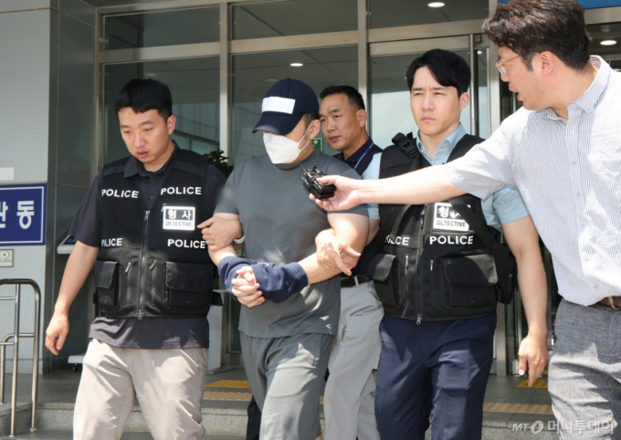 동탄 삼성맨 보증금 32억 '꿀꺽'…해외 도피 검찰수사관 구속송치