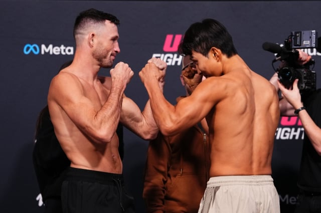 朱利安·伊罗萨（左）与李正英在赛前对峙中。/照片=UFC提供