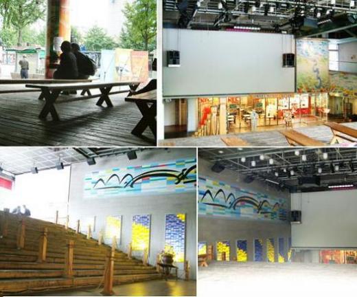 ↑서울 신촌의 '아트레온광장'. 정면과 측면벽 위쪽에 우석 최규명 선생의 작품을 현대화한 디지털 작품을 설치했다. ⓒ아트레온