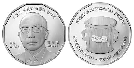 ↑한국조폐공사가 '한국의 인물 100인 시리즈 메달' 가운데 하나로 제작한 박두병 두산 초대회장의 기념메달(앞면과 뒷면)