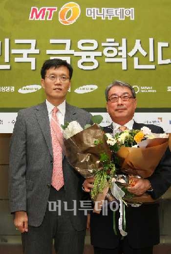 이창용 금융위 부위원장(왼쪽)과 장형덕 비씨카드 사장.