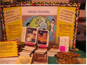 ↑ 미국 샌프란시스코주 니미츠초등학교 도서전시회의 '다양성위원회' 홍보코너. (자료:한국이주민건강협회)