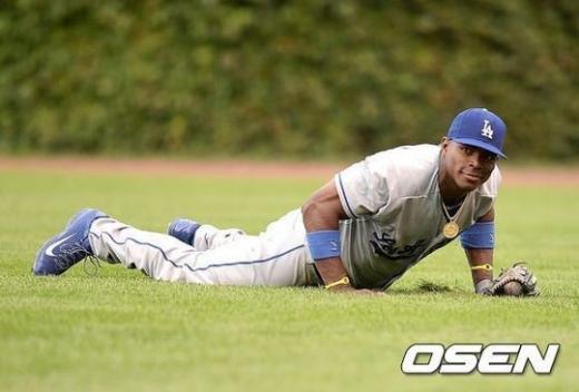 ↑쿠바산 '괴물 신인' 야시엘 푸이그, 그의 야구는 기본도 모르는 천방지축인가, 자유로움으로 가득찬 창조야구인가. ⓒ사진제공 = OSEN