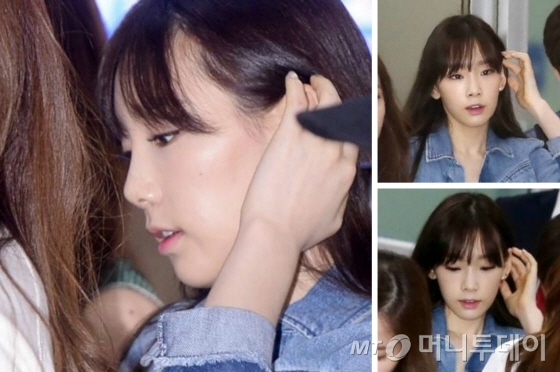 24일 오전 일본에서 소녀시대 콘서트 일정을 마치고 멤버들과 함께 김포공항을 통해 입국한 태연 /사진=홍봉진 기자