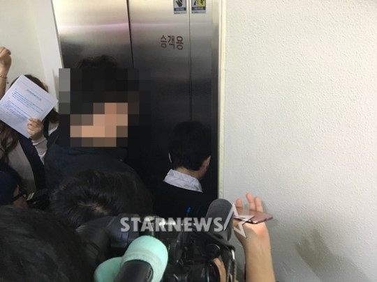 빅뱅 탑의 모친이 의식을 잃은 빅뱅 탑을 면회했다/사진제공=스타뉴스
