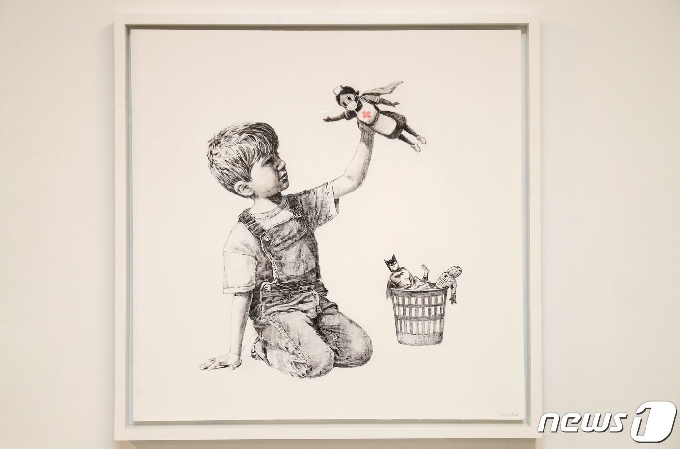 영국의 얼굴없는 미술가 뱅크시가 그린 '게임 체인저' © AFP=뉴스1