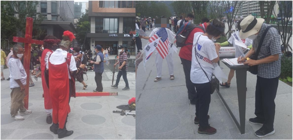 광복절 당일인 15일 오후 일부 시민들은 광화문 광장에서 고대 로마군과 예수 복장을 하고 십자가형을 재현하거나 서명운동을 했다./사진=김성진 기자