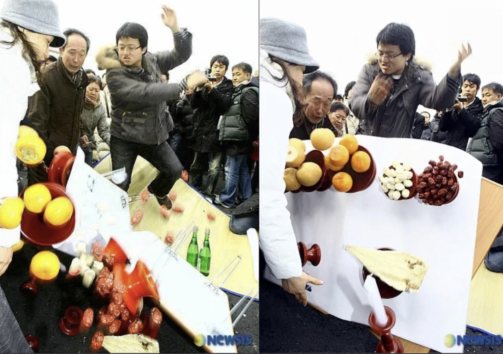 제삿상을 뒤엎는 유족/사진=뉴시스