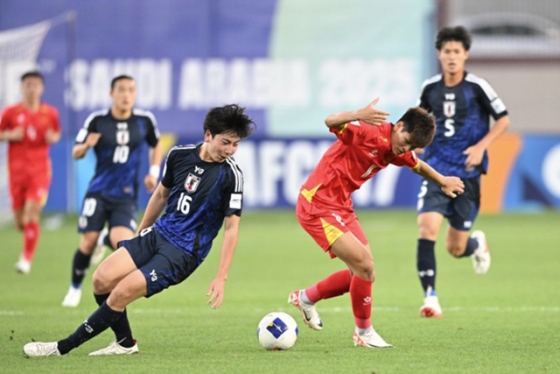 일본과 베트남(빨간색 유니폼)의 경기. /사진=아시아축구연맹 홈페이지 캡처
