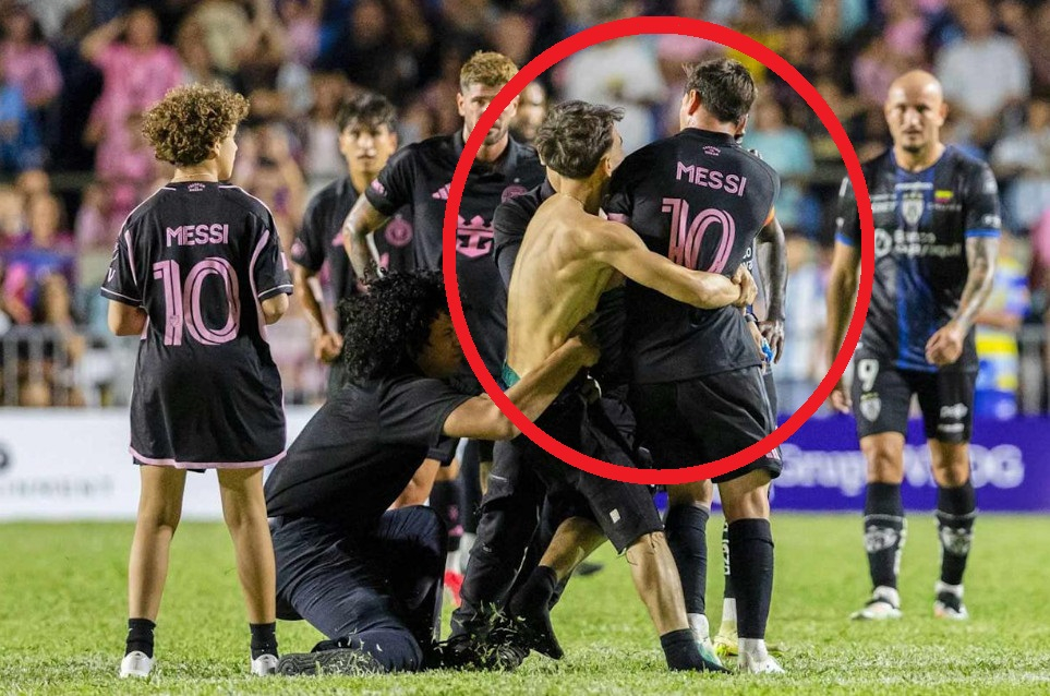 경기장에 난입한 팬(빨간 원)이 리오넬 메시를 껴안고 있다. /사진=AOL 갈무리