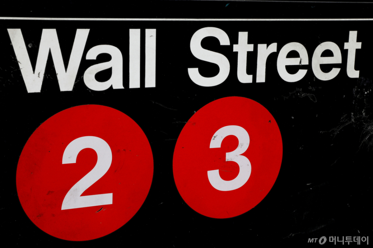 A sign for the Wall Street subway station in the financial district in New York City, U.S., August 23, 2018. REUTERS/Brendan McDermid/File Photo