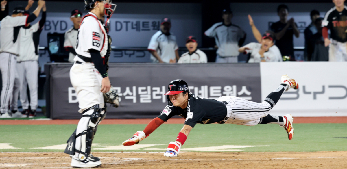 LG 2번타자 박해민이 4일 수원KT위즈파크에서 열리는 2026KBO리그  KT위즈와 LG트윈스 경기 7회초 1사 2루 오스탄 타석때 견제구가 뒤로 빠진 사이 2루에서 홈까지 뛰어들어 득점하고 있다.  LG는 7회초 6-3으로 전세를 뒤집고 있다.  2026.06.04. /사진=강영조 cameratalks@