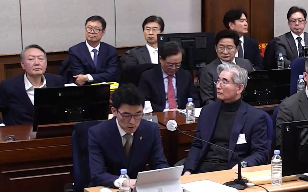 윤석열 전 대통령, 김용현 전 국방부 장관 등이 서울 서초구 서울중앙지방법원에서 열린 내란 우두머리 혐의 1심 결심 공판에 참석해 자리에 앉아 있다. /사진=뉴스1