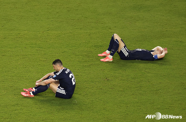 아쉬워하는 스코틀랜드 축구대표팀. /AFPBBNews=뉴스1