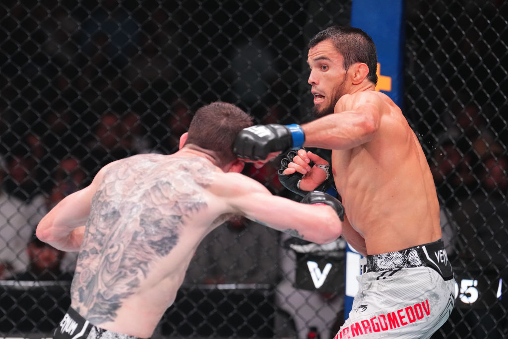 우마르 누르마고메도프 vs 코리 샌드헤이건. /사진=UFC 제공