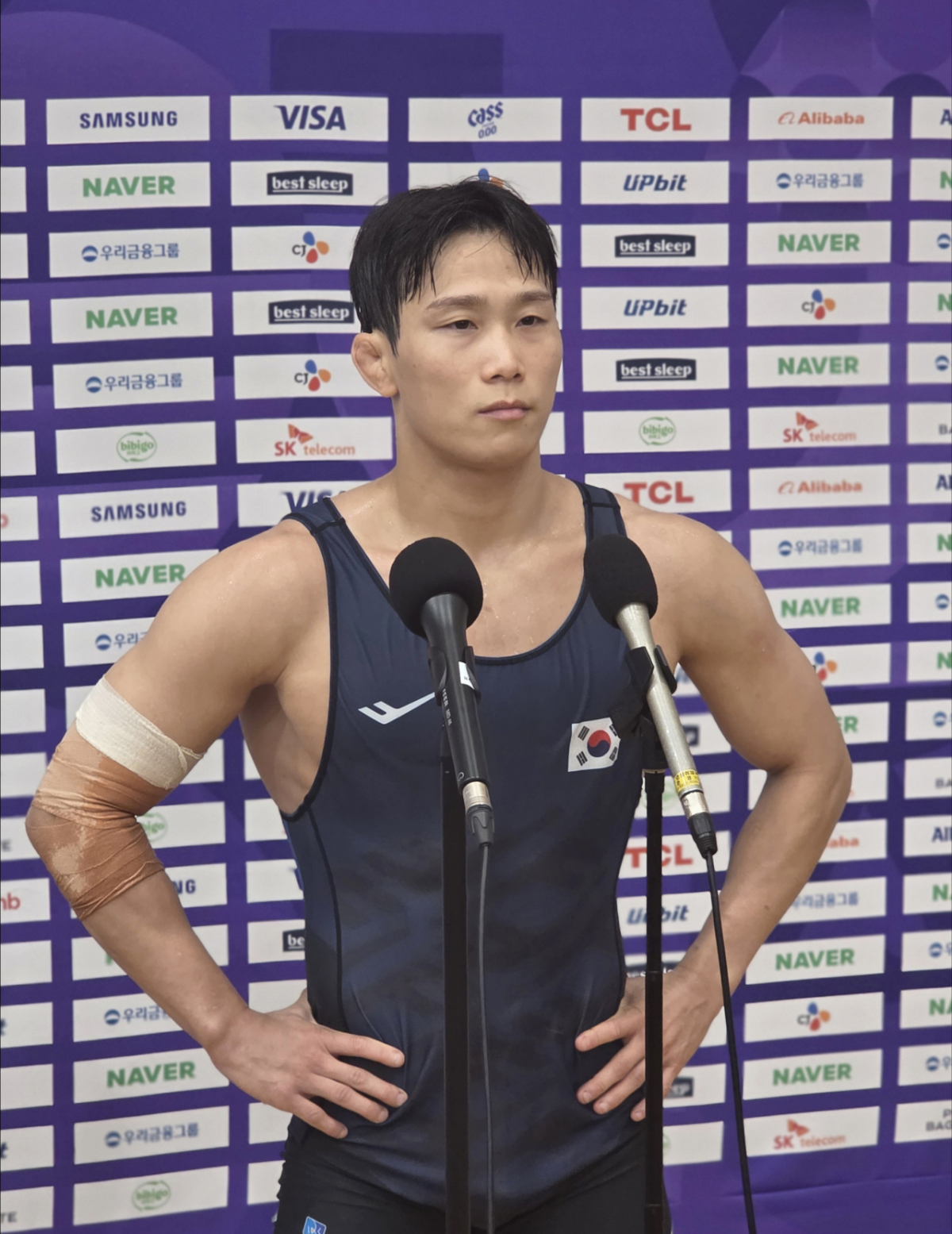 20일 충북 진천 국가대표 선수촌에서 진행된 2026 아이치·나고야 하계 아시아경기대회(아시안게임) D-30 미디어데이 레슬링 공개 훈련을 마친 뒤 취재진 질문에 답하고 있는 레슬링 국가대표 정한재. /사진=김명석 기자