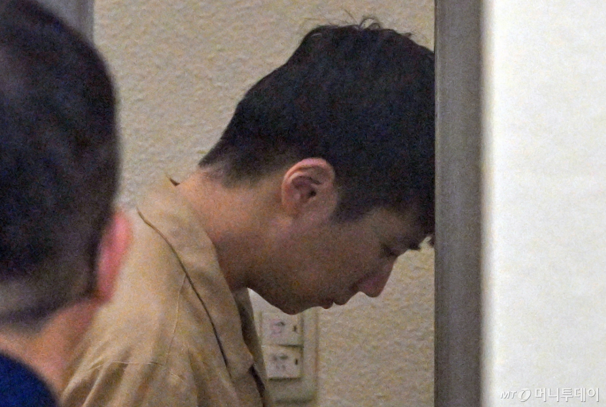 성폭력범죄의 처벌 등에 관한 특례법 위반(강간 등 살인) 혐의로 기소된 장윤기가 지난달 30일 1심 선고 공판을 받기위해 광주지법에 출석하고 있다./ 사진=머니투데이 DB