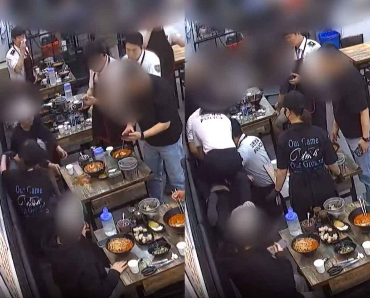 인천 한 식당에서 손님이 쓰러지자 직원과 경찰관들이 달려와 심폐소생술하는 모습. /사진=보배드림 갈무리