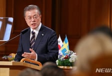 능라도에서 스톡홀름까지 온 김정은의 약속…文 "의지 보이라"