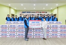 SNT모티브 나눔 봉사활동…300가구에 방한용품 전달