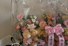 금메달 받자 깜짝 선물…최가온 챙긴 '키다리 아저씨' 신동빈 회장