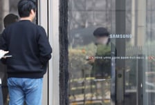 허리띠 죄는 삼성, 머리띠 매는 노조