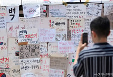 핸드볼 대표팀 수색에 기자 폭행까지…개표소 시위 참가자 수사