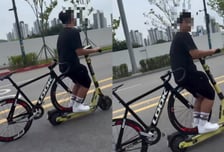 킥보드에 자전거 올리고 도로 위 '기괴한 질주'…"조회수 노렸나"