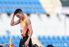 스마일 점퍼의 '잃어버린 22cm'... 우상혁, 2m14 최하위 "AG 앞두고 연속 최하위권" 부상 후유증 심각