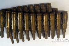아파트 비상계단에 군용 실탄 14발...짐 옮기다 흘렸다