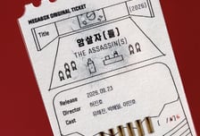"몰지각" "전량 폐기"...암살자(들), 이번엔 '탄흔 굿즈' 논란