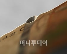 "벌어지는 5만원권 일정쫓겨 유통"