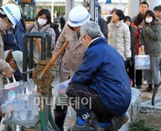 [日 대지진]후쿠시마현, 물·식량 부족한 '유령도시'
