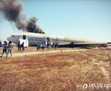 일부승객들 대피중 짐챙겨 부상확대?